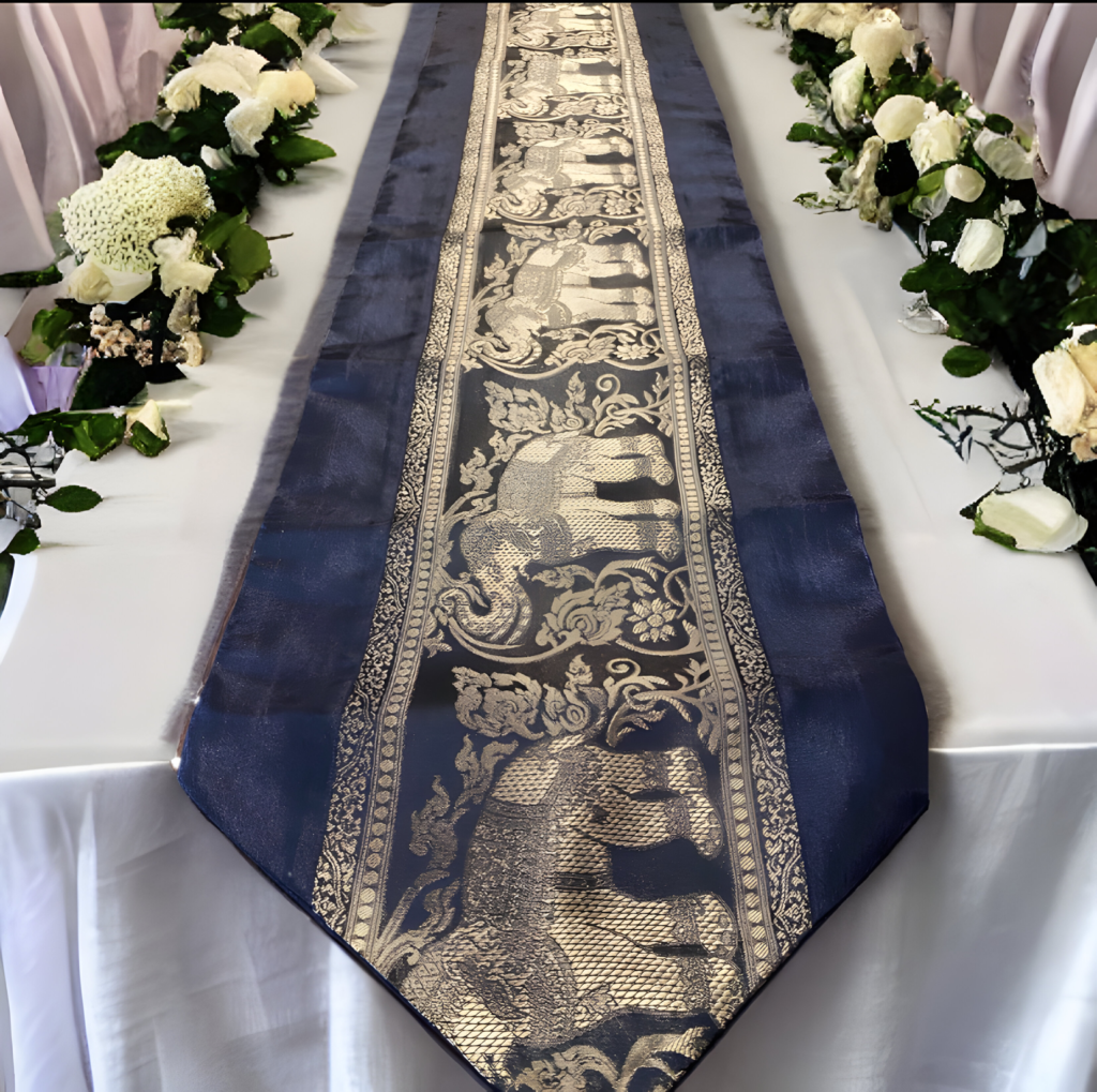 Thai table runner decorated with gold color elephants and black background