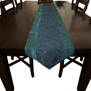 Decorative Thai silk table runner with teal and blue quilted design.